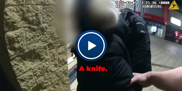 Officer arresting man with knife