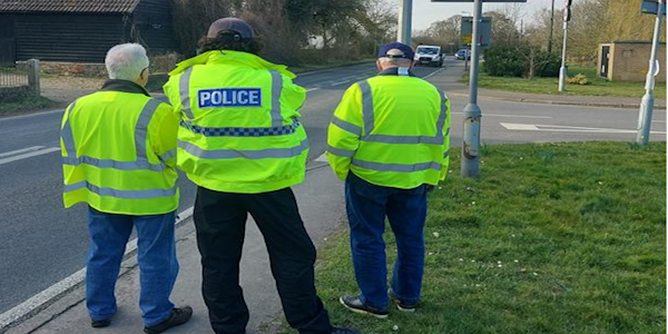 PC Samspon holding a speed device with CSW members