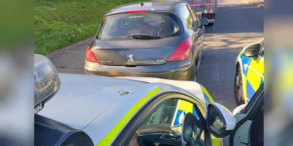 Three males arrested on suspicion of possessing a firearm and being in possession of criminal property