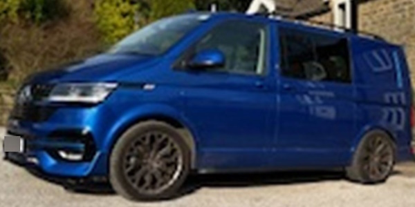 Picture of a blue VW transporter