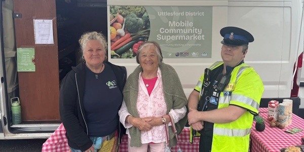 PCSO Mike O'Donnell Smith standing with community members