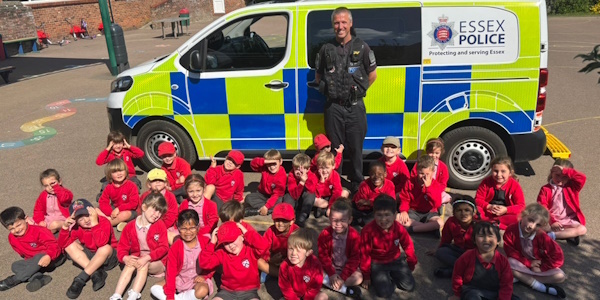 PC McNamara with children from Thomas More Primary 