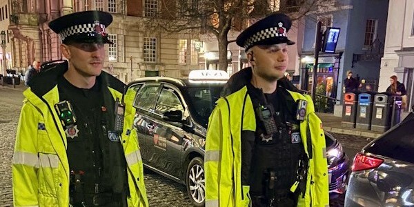 Two officers patrol the hotspot zone in Colchester at night