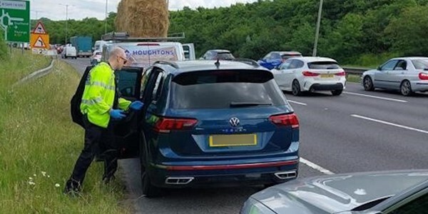 Officer with a driver at the roadside