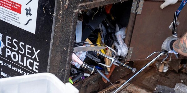 An Essex Police knife bin being emptied showing various knives and bladed implements