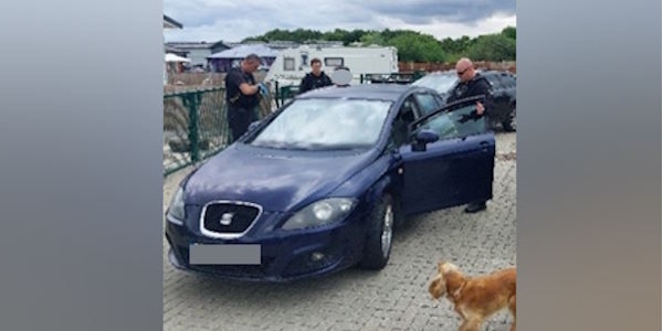 Officers searching car