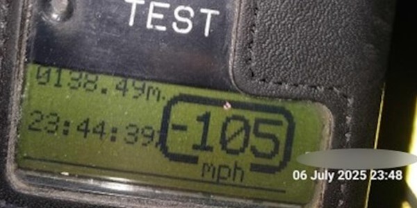 Speed detection device displaying a recorded speed of 105 miles per hour