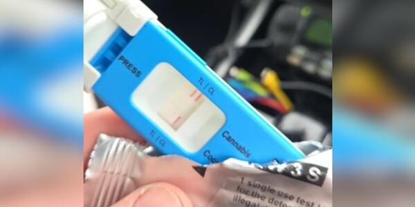 Blue and white plastic drug testing kit