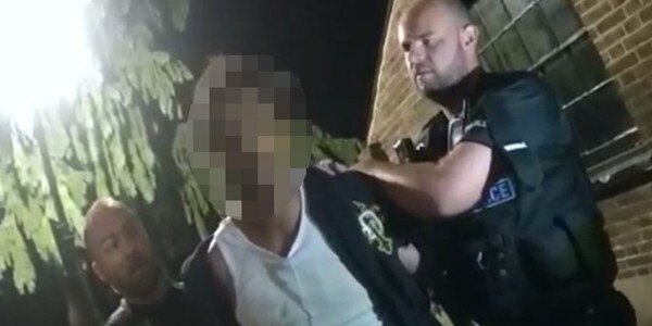 Body warn video image of officers make an arrest in the town