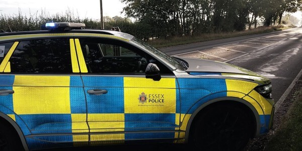 Police patrol car at a cordon on the A414