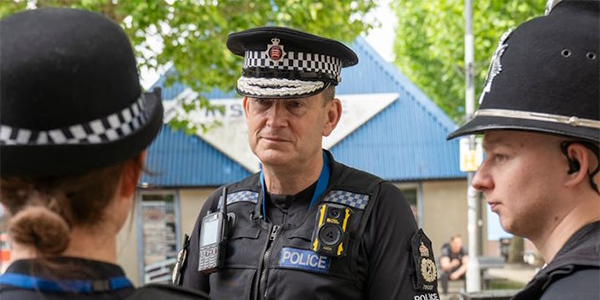 Chief Constable BJ Harrington speaks to uniformed police officers