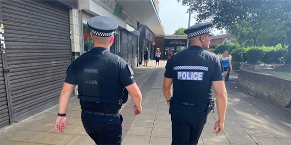 Uniformed police officers on patrol