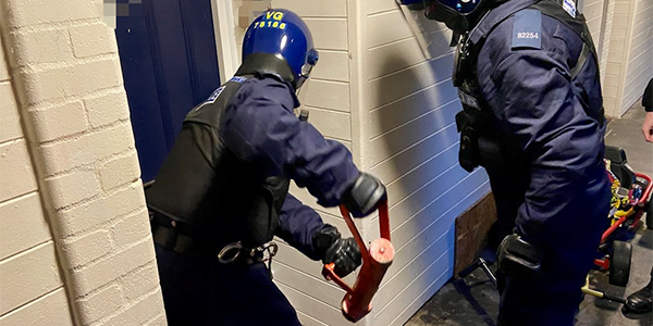 Officers force entry into property