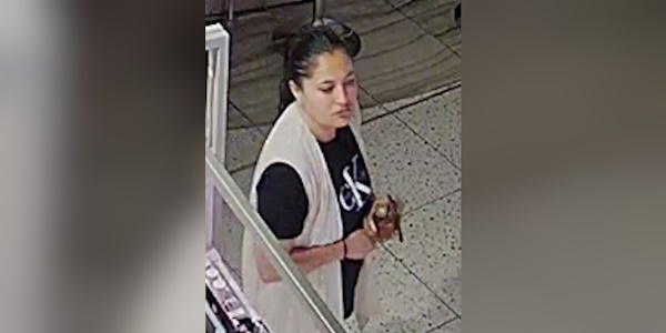 cctv image of a female suspect from a shoplifting incident