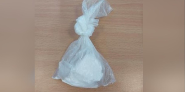 a bag containing a white powdered substance suspected to be Class A drugs