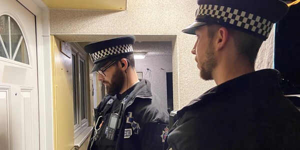 Two response officers attending an address