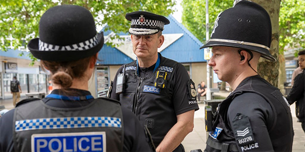 Essex Police Chief Constable out with two of his uniformed officers