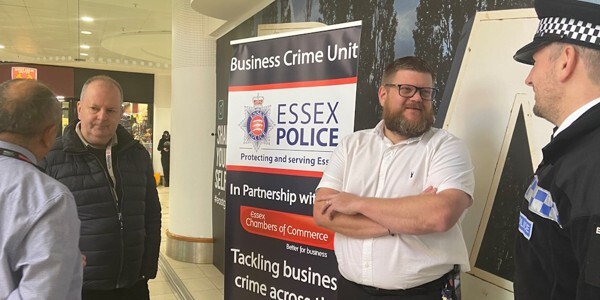 Retailers and officers discussing the use of the app