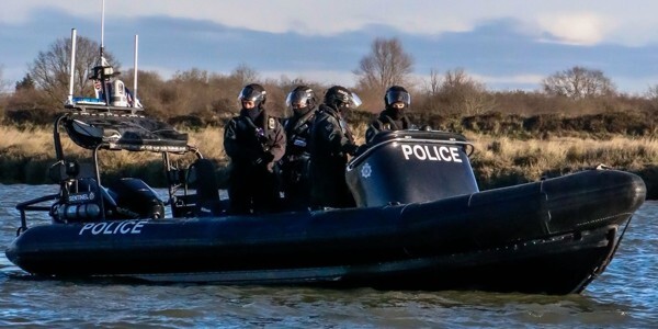 Officers in a boat on patrol