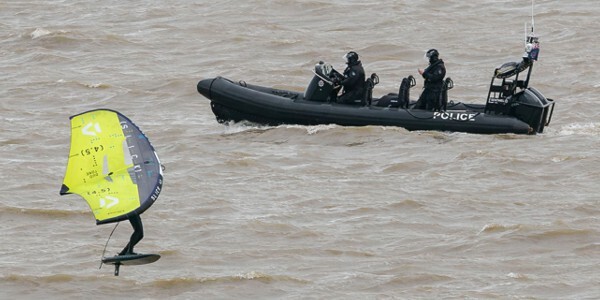 Marine Unit's RHIB Sentinel patrolling near to a wing foiler