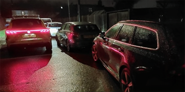 Police car on street at night