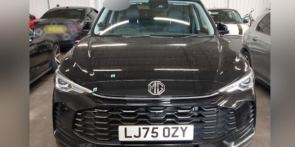 MG black car reg LJ750ZY