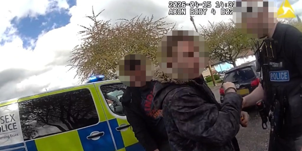 Burglar being arrested by officers
