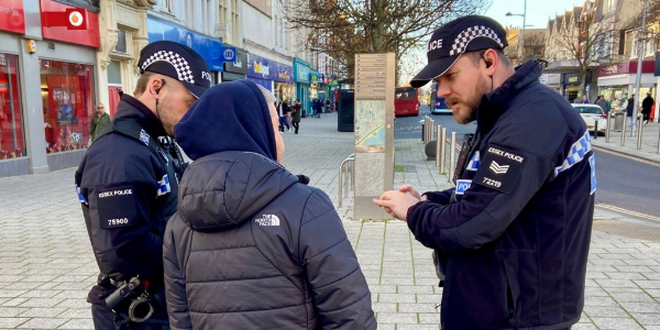 Officers engage with young people while on patrol 