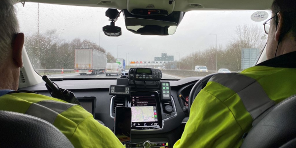 Police officers in a police car
