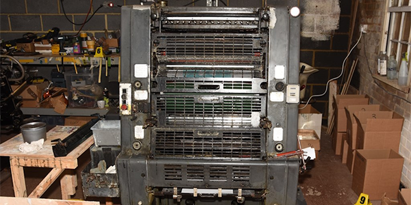 An ink printing press found in the workshop