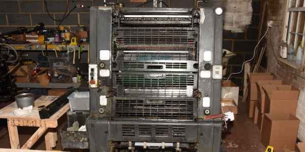 An ink printing press found in the workshop