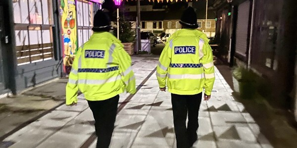 Two uniformed police officers on patrol in Southend
