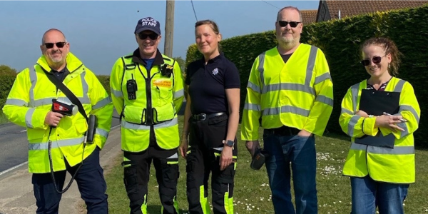 Volunteers for essex police in high vis vests 