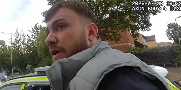 Klavi Likcani captured on police body worn video is taken to custody after his arrest.