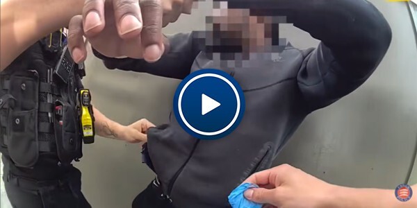 Body worn video of officers arresting man riding illegal e-scooter with a knife