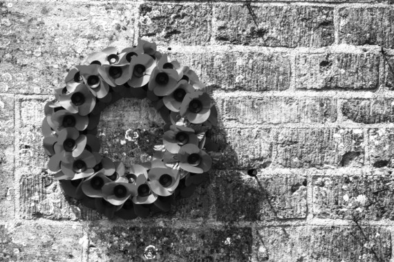 Black and white photo of poppy wreath