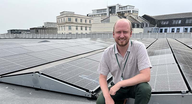 Councillor Briars Delve with the new solar panels at the Theatre Royal car park