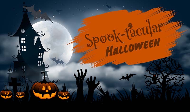 Image with pumpkins at night saying spook-tacular halloween