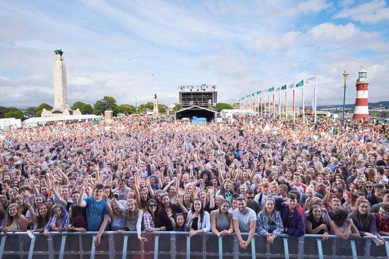 crowd enjoying a concert on the Hoe