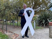 PFCC Roger Hirst with the white ribbon