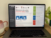 Picture of a laptop screen with the home safety check website