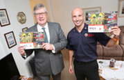 Roger Hirst and Rick Hylton launching Fire and Rescue Plan