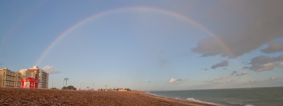 Southsea beach with rainbow in background