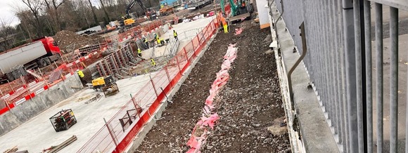 a path built next to a under construction swimming pool