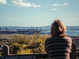 a lady looking out over portsdown hill