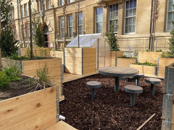 Wooden plant boxes and seating area