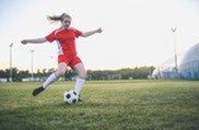 woman playing football