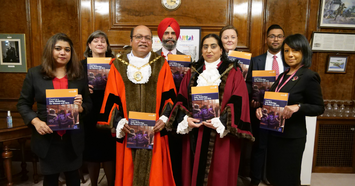 Councillors standing in council chamber