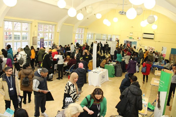 People in room attending careers fair