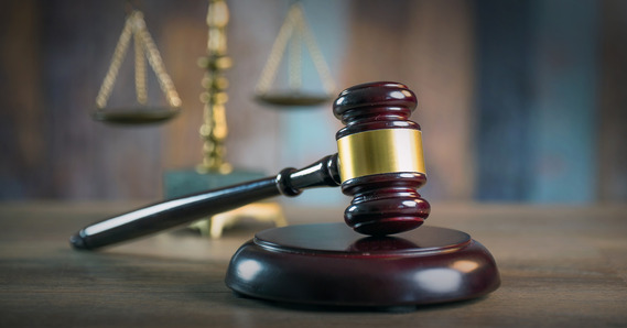 Mallet of the judge, books, scales of justice